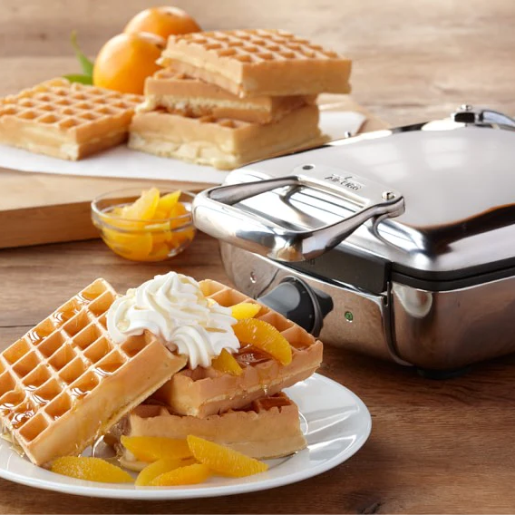https://www.kitchenkapers.com/cdn/shop/products/all-clad-4-slice-belgian-waffler-lifestyle_568x568.png?v=1676575376